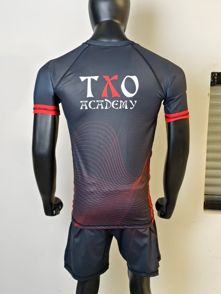 Custom fight kit designed for TXO Academy — matching rashguard and fight shorts.