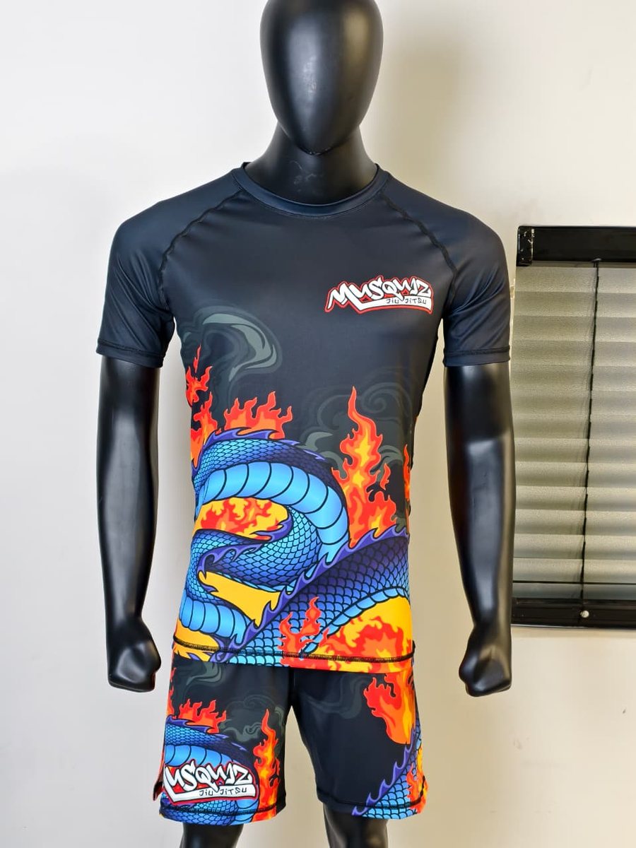 Custom fight kit designed for Musquiz — matching rashguard and fight shorts.