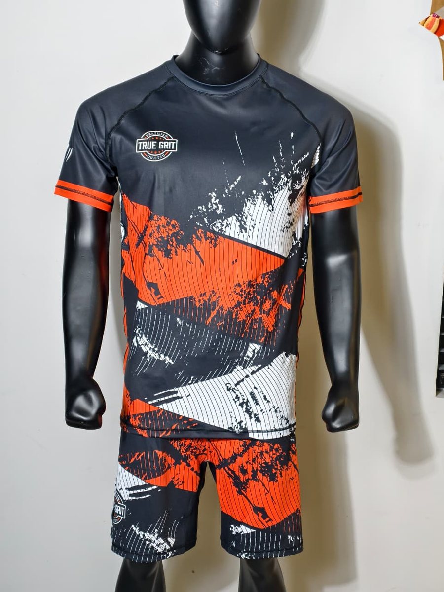 Custom fight kit designed for True Grit — matching rashguard and fight shorts.
