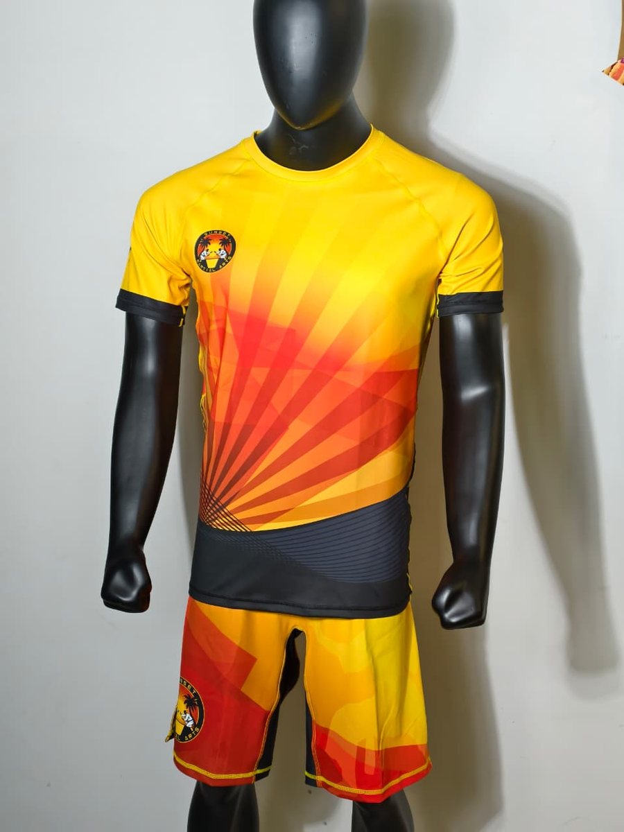 Custom fight kit designed for Sunset Martial Arts — matching rashguard and fight shorts.