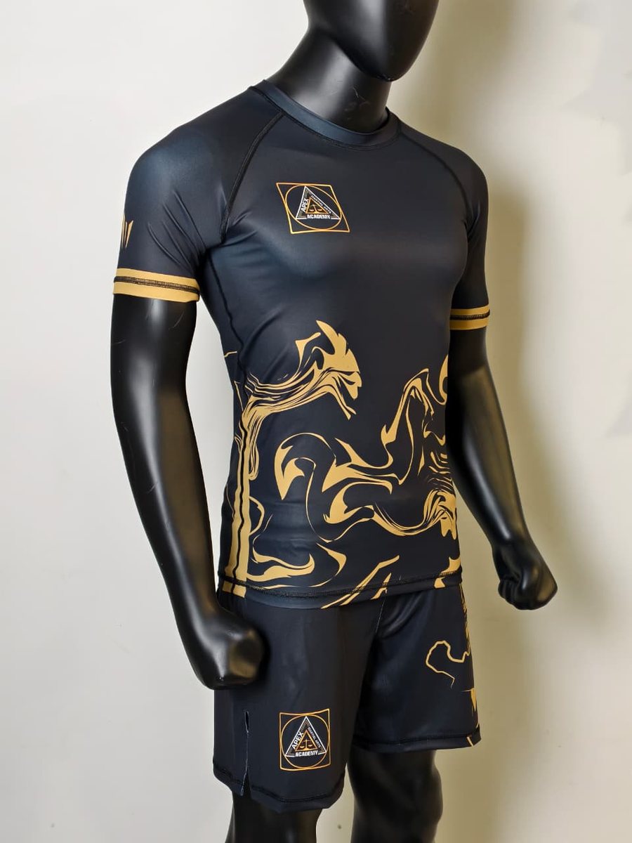 Custom fight kit designed for Apex MMA — matching rashguard and fight shorts.